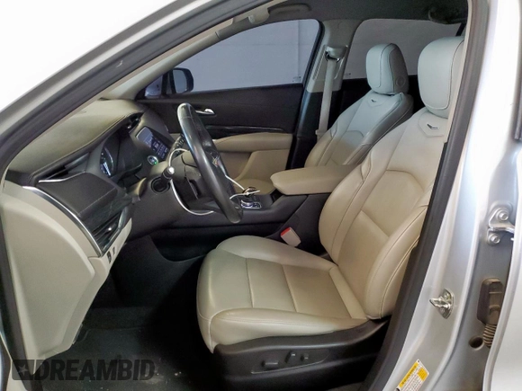 2022 Cadillac XT4 FWD Premium Luxury with VIN 1GYFZCR47NF100232, listed as a Copart auction lot 54520405 with 68,819 mi miles and Clean title. Bid and sale history available at DreamBid. Image 7.