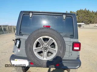 2018 Jeep Wrangler Unlimited Sahara with VIN 1C4HJXEN9JW303094, listed as a IAAI auction lot 41491564 with 66,128 mi miles and . Bid and sale history available at DreamBid. Image 16.