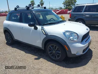 2014 MINI Countryman S z VIN WMWZC3C56EWP52407, wystawiony jako IAAI lot #42255716 z przebiegiem 74 943 mil mil oraz . Historia ofert i sprzedaży dostępna na DreamBid. Obrazek 1.
