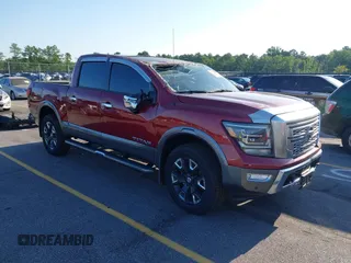 2021 Nissan Titan Pro-4X with VIN 1N6AA1ED4MN525555, listed as a IAAI auction lot 42563247 with 63,259 mi miles and . Bid and sale history available at DreamBid. Image 1.