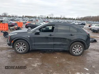 2021 Cadillac XT4 AWD Sport with VIN 1GYFZFR49MF065225, listed as a IAAI auction lot 41191994 with 58,095 mi miles and . Bid and sale history available at DreamBid. Image 14.