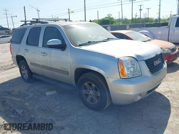 2013 GMC Yukon SLT with VIN 1GKS1CE09DR268602, listed as a IAAI auction lot 41992325 with 167,476 mi miles. Bid and sale history available at carsss.com. Image 1.