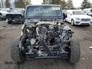 2021 Jeep Gladiator Rubicon with VIN 1C6JJTBG4ML504141, listed as a Copart auction lot 43367565 with 56,879 mi miles and Salvage title. Bid and sale history available at DreamBid. Image 5.