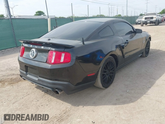 2010 Ford Mustang GT500 with VIN 1ZVBP8JS9A5130203, listed as a IAAI auction lot 42064720 with 32,461 mi miles. Bid and sale history available at carsss.com. Image 4.