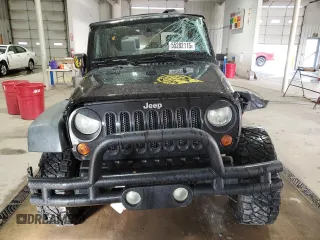 2008 Jeep Wrangler Unlimited X с VIN 1J4GA39128L632897, выставлен на аукционе Copart как лот 55282115 с пробегом 167 844 миль миль и Списание • Salvage title. История ставок и продаж доступна на DreamBid. Изображение 5.