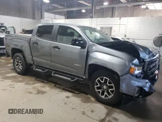 2021 GMC Canyon 4WD AT4 z VIN 1GTG6FEN1M1203936, wystawiony jako Copart lot #56041315 z przebiegiem 54 939 mil mil oraz Szkoda całkowita • Salvage title. Historia ofert i sprzedaży dostępna na DreamBid. Obrazek 4.