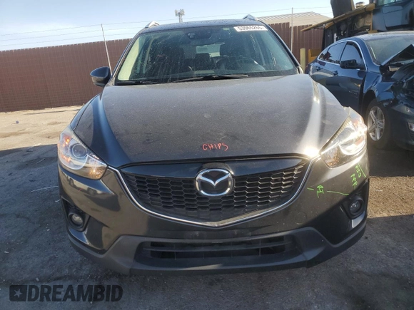 2014 Mazda CX-5 Grand Touring with VIN JM3KE4DY1E0328852, listed as a Copart auction lot 53965265 with 67,242 mi miles and Salvage Title. Bid and sale history available at DreamBid. Image 5.