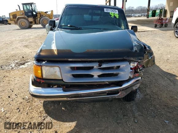 1997 Ford Ranger XLT with VIN 1FTCR10AXVPB26107, listed as a Copart auction lot 49113425 with 148,630 mi miles and Salvage Title. Bid and sale history available at DreamBid. Image 5.