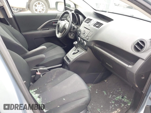 2013 Mazda 5 Touring z VIN JM1CW2CL1D0147902, wystawiony jako IAAI lot #42379728 z przebiegiem Nie podano mil oraz . Historia ofert i sprzedaży dostępna na DreamBid. Obrazek 5.