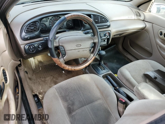 1998 Ford Contour SE z VIN 1FAFP6637WK280190, wystawiony jako Copart lot #84331424 z przebiegiem 185 754 mil mil oraz Czysty tytuł • Clean title. Historia ofert i sprzedaży dostępna na DreamBid. Obrazek 8.