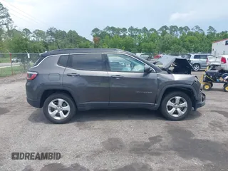 2018 Jeep Compass Latitude with VIN 3C4NJDBB6JT342520, listed as a IAAI auction lot 42464673 with 66,680 mi miles and . Bid and sale history available at DreamBid. Image 13.