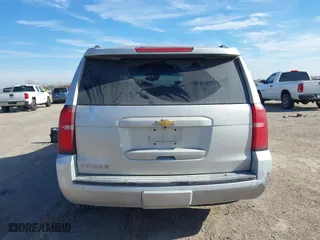 2020 Chevrolet Tahoe LT with VIN 1GNSCBKC5LR226822, listed as a IAAI auction lot 41334853 with 77,091 mi miles. Bid and sale history available at carsss.com. Image 16.