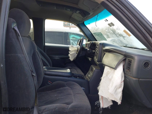 1999 Chevrolet Silverado 1500 LS with VIN 2GCEC19T4X1165256, listed as a IAAI auction lot 41236272 with 77,004 mi miles. Bid and sale history available at carsss.com. Image 5.