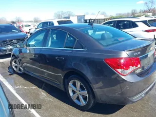 2014 Chevrolet Cruze 2LT z VIN 1G1PE5SB7E7200554, wystawiony jako IAAI lot #41739058 z przebiegiem 103 259 mil mil oraz . Historia ofert i sprzedaży dostępna na DreamBid. Obrazek 14.