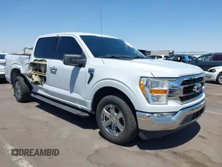 2021 Ford F-150 XL with VIN 1FTEW1CP4MKD82871, listed as a IAAI auction lot 42301025 with 54,757 mi miles and . Bid and sale history available at DreamBid. Image 1.
