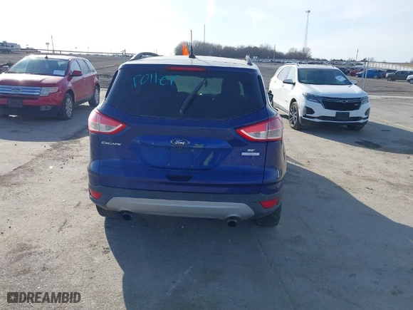 2014 Ford Escape SE with VIN 1FMCU0GX0EUB45748, listed as a IAAI auction lot 41778738 with 305,995 mi miles. Bid and sale history available at carsss.com. Image 6.