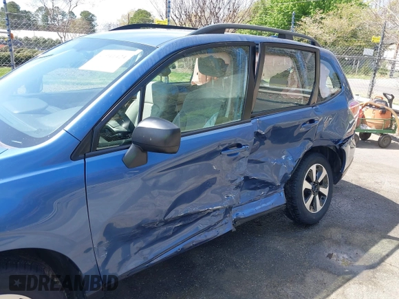 2018 Subaru Forester z VIN JF2SJABC9JH525596, wystawiony jako IAAI lot #41941424 z przebiegiem 32 622 mil mil oraz . Historia ofert i sprzedaży dostępna na DreamBid. Obrazek 17.
