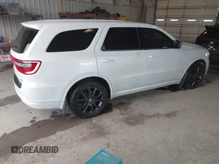 2016 Dodge Durango R/T with VIN 1C4SDJCT0GC419015, listed as a IAAI auction lot 41712230 with 159,523 mi miles and . Bid and sale history available at DreamBid. Image 4.