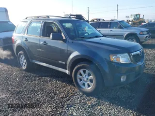 2008 Mazda Tribute Touring with VIN 4F2CZ96168KM05738, listed as a IAAI auction lot 41403675 with 217,593 mi miles. Bid and sale history available at carsss.com. Image 1.