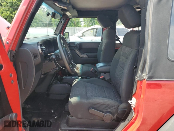 2012 Jeep Wrangler Sport with VIN 1C4AJWAG9CL212222, listed as a Copart auction lot 61919275 with 183,729 mi miles and Clean title. Bid and sale history available at DreamBid. Image 7.