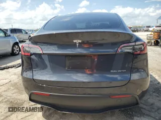 2024 Tesla Model Y Long Range z VIN 7SAYGDEE4RA251337, wystawiony jako Copart lot #59844555 z przebiegiem 16 011 mil mil oraz Szkoda całkowita • Salvage title. Historia ofert i sprzedaży dostępna na DreamBid. Obrazek 6.