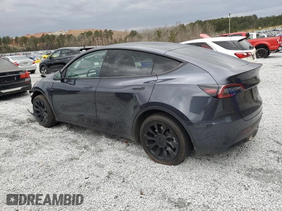 2025 Tesla Model Y Long Range with VIN 7SAYGDED9SA341967, listed as a Copart auction lot 47368695 with 4,310 mi miles and Salvage Title. Bid and sale history available at DreamBid. Image 2.