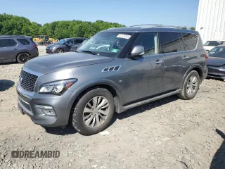 2016 Infiniti QX80 z VIN JN8AZ2NEXG9124118, wystawiony jako Copart lot #61179245 z przebiegiem 186 358 mil mil oraz Szkoda całkowita • Salvage title. Historia ofert i sprzedaży dostępna na DreamBid. Obrazek 1.