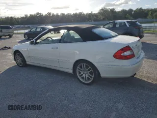 2008 Mercedes-Benz CLK 350 with VIN WDBTK56F28F240335, listed as a Copart auction lot 76526334 with 124,303 mi miles and Salvage Title. Bid and sale history available at DreamBid. Image 2.