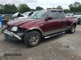 2003 Ford F-150 XL with VIN 1FTRX07L73KC07352, listed as a Copart auction lot 64639214 with 108,003 mi miles and Salvage title. Bid and sale history available at DreamBid. Image 1.
