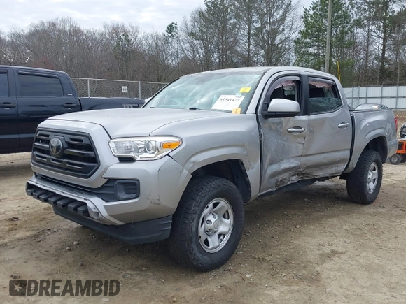2018 Toyota Tacoma SR with VIN 3TMCZ5AN4JM130307, listed as a IAAI auction lot 41541477 with 74,369 mi miles and . Bid and sale history available at DreamBid. Image 6.