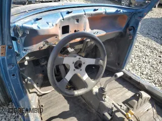 1973 Volkswagen Beetle with VIN 1332477215, listed as a Copart auction lot 77263164 with Not Provided miles and Salvage Title. Bid and sale history available at DreamBid. Image 8.