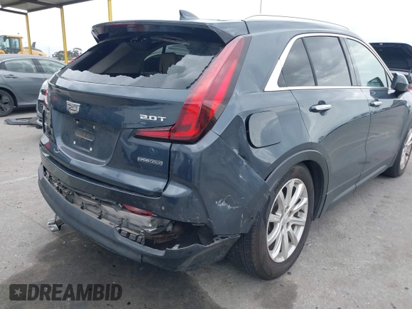 2019 Cadillac XT4 AWD Luxury with VIN 1GYFZBR41KF160352, listed as a IAAI auction lot 42047477 with 58,850 mi miles and . Bid and sale history available at DreamBid. Image 6.