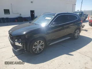 2016 BMW X1 xDrive28i z VIN WBXHT3C3XG5E51795, wystawiony jako Copart lot #57178065 z przebiegiem 78 677 mil mil oraz Szkoda całkowita • Salvage title. Historia ofert i sprzedaży dostępna na DreamBid. Obrazek 1.