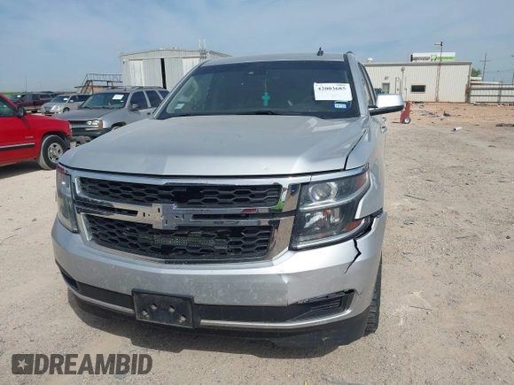 2015 Chevrolet Tahoe LT with VIN 1GNSCBKC9FR111984, listed as a IAAI auction lot 42003685 with 186,391 mi miles and . Bid and sale history available at DreamBid. Image 12.