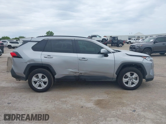 2020 Toyota RAV4 XLE with VIN 2T3W1RFV4LW094687, listed as a IAAI auction lot 42652039 with 56,693 mi miles and . Bid and sale history available at DreamBid. Image 13.