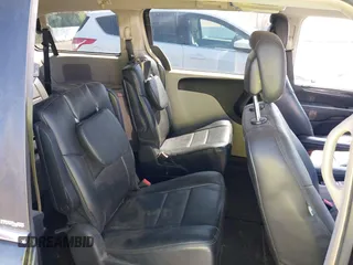 2011 Chrysler Town & Country Touring with VIN 2A4RR5DG2BR702731, listed as a IAAI auction lot 42095661 with 202,968 mi miles and . Bid and sale history available at DreamBid. Image 8.