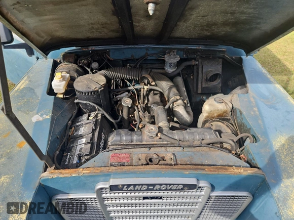 1976 Land Rover Defender с VIN 90123300A, выставлен на аукционе Copart как лот 81744514 с пробегом Не указан миль и Чистый • Clean title. История ставок и продаж доступна на DreamBid. Изображение 7.