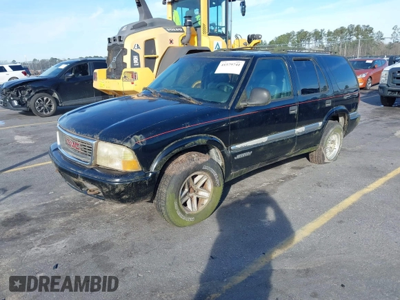 1998 GMC Jimmy SLT with VIN 1GKDT13W5W2502521, listed as a IAAI auction lot 41579741 with 176,802 mi miles. Bid and sale history available at carsss.com. Image 2.