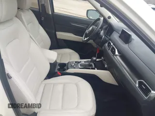 2020 Mazda CX-5 Grand Touring with VIN JM3KFBDM5L0731373, listed as a IAAI auction lot 41900567 with 31,268 mi miles and . Bid and sale history available at DreamBid. Image 5.
