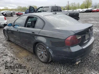 2007 BMW 3 Series 328xi with VIN WBAVC93517KX58143, listed as a Copart auction lot 52036035 with 161,954 mi miles and Salvage title. Bid and sale history available at DreamBid. Image 2.