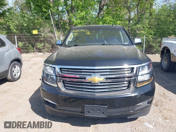 2015 Chevrolet Tahoe LTZ z VIN 1GNSKCKC8FR141163, wystawiony jako IAAI lot #42114008 z przebiegiem 221 804 mil mil oraz . Historia ofert i sprzedaży dostępna na DreamBid. Obrazek 12.