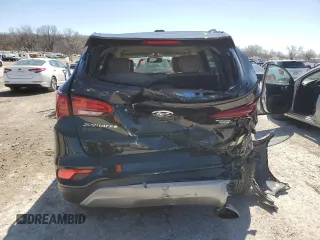 2017 Hyundai Santa Fe 2.4L z VIN 5NMZUDLB4HH032235, wystawiony jako Copart lot #49769775 z przebiegiem 102 655 mil mil oraz Szkoda całkowita • Salvage title. Historia ofert i sprzedaży dostępna na DreamBid. Obrazek 6.