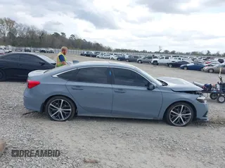 2023 Honda Civic Touring z VIN 2HGFE1F95PH325015, wystawiony jako IAAI lot #41796024 z przebiegiem 39 333 mil mil oraz . Historia ofert i sprzedaży dostępna na DreamBid. Obrazek 14.