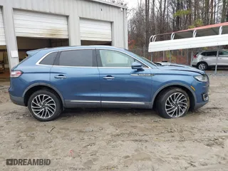 2019 Lincoln Nautilus Reserve with VIN 2LMPJ8LP9KBL14914, listed as a IAAI auction lot 41561348 with 8,887 mi miles. Bid and sale history available at carsss.com. Image 13.