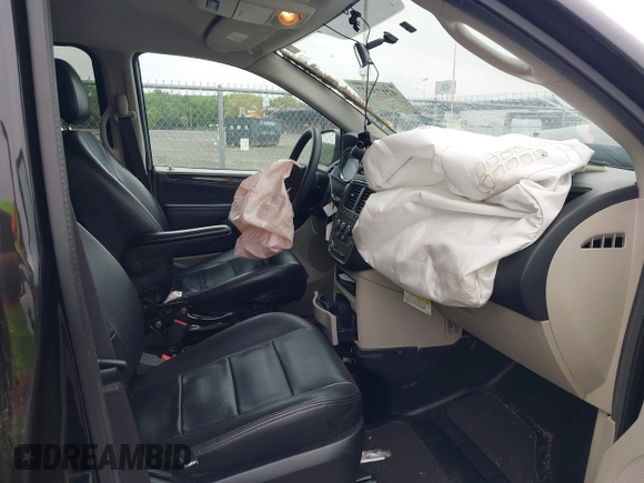 2018 Dodge Grand Caravan SE with VIN 2C7WDGBG5JR190468, listed as a IAAI auction lot 42173227 with 49,451 mi miles and . Bid and sale history available at DreamBid. Image 5.