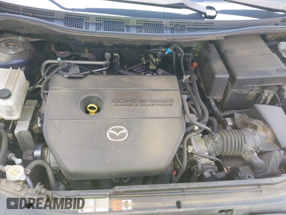 2009 Mazda 5 Touring with VIN JM1CR29L890340411, listed as a IAAI auction lot 42270019 with 150,892 mi miles and . Bid and sale history available at DreamBid. Image 10.