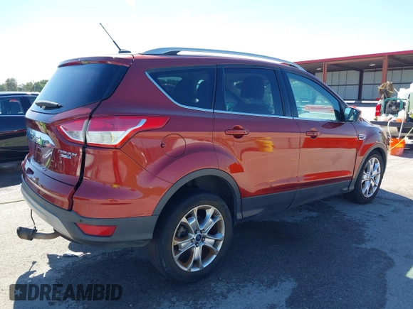 2015 Ford Escape Titanium with VIN 1FMCU9J92FUA53699, listed as a IAAI auction lot 40500310 with 197,581 mi miles. Bid and sale history available at carsss.com. Image 4.