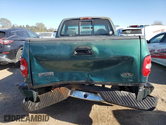 1999 Ford F-150 XL with VIN 2FTZF0720XCA14612, listed as a Copart auction lot 75092304 with 230,897 mi miles and Salvage Title. Bid and sale history available at carsss.com. Image 6.