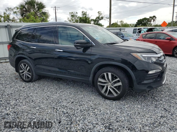 2017 Honda Pilot Touring with VIN 5FNYF6H9XHB075468, listed as a Copart auction lot 50012215 with 90,718 mi miles and Salvage Title. Bid and sale history available at carsss.com. Image 4.