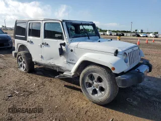 2016 Jeep Wrangler Unlimited Sahara with VIN 1C4BJWEG6GL301301, listed as a Copart auction lot 54362595 with 110,295 mi miles and Salvage title. Bid and sale history available at DreamBid. Image 4.